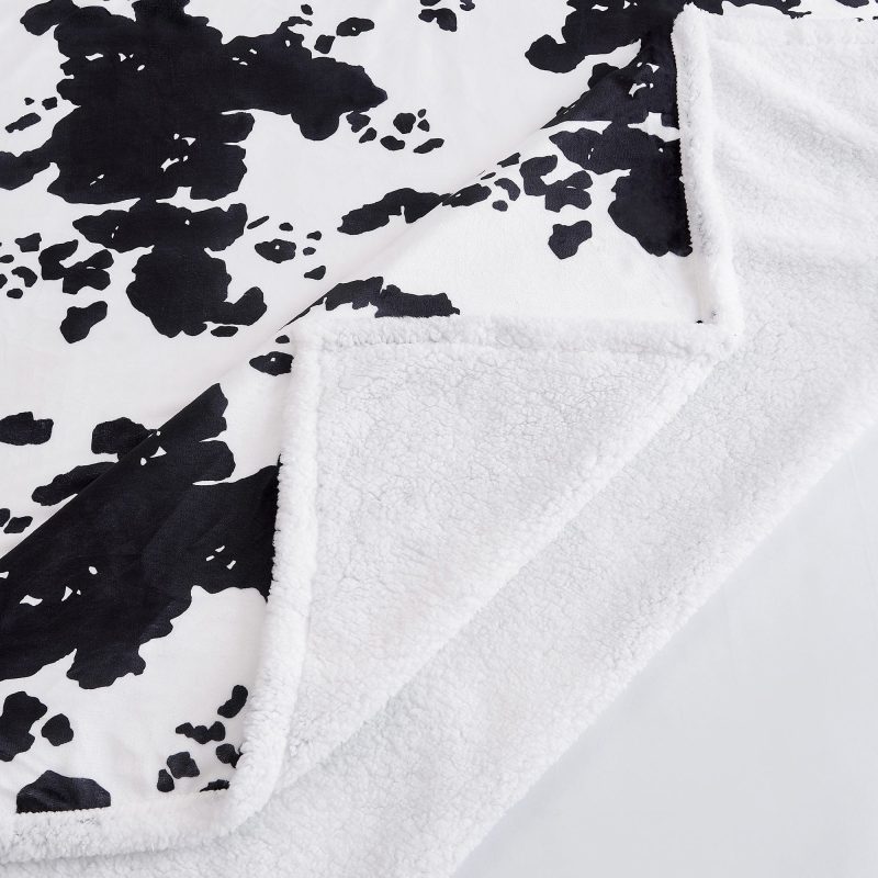 paseo road throw elsa cowhide campfire sherpa throw 39395079225560